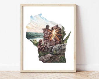 May include: A watercolor painting of the state of Wisconsin, with a scenic landscape of a lake and rock formations in the shape of a window, with the sun shining through.