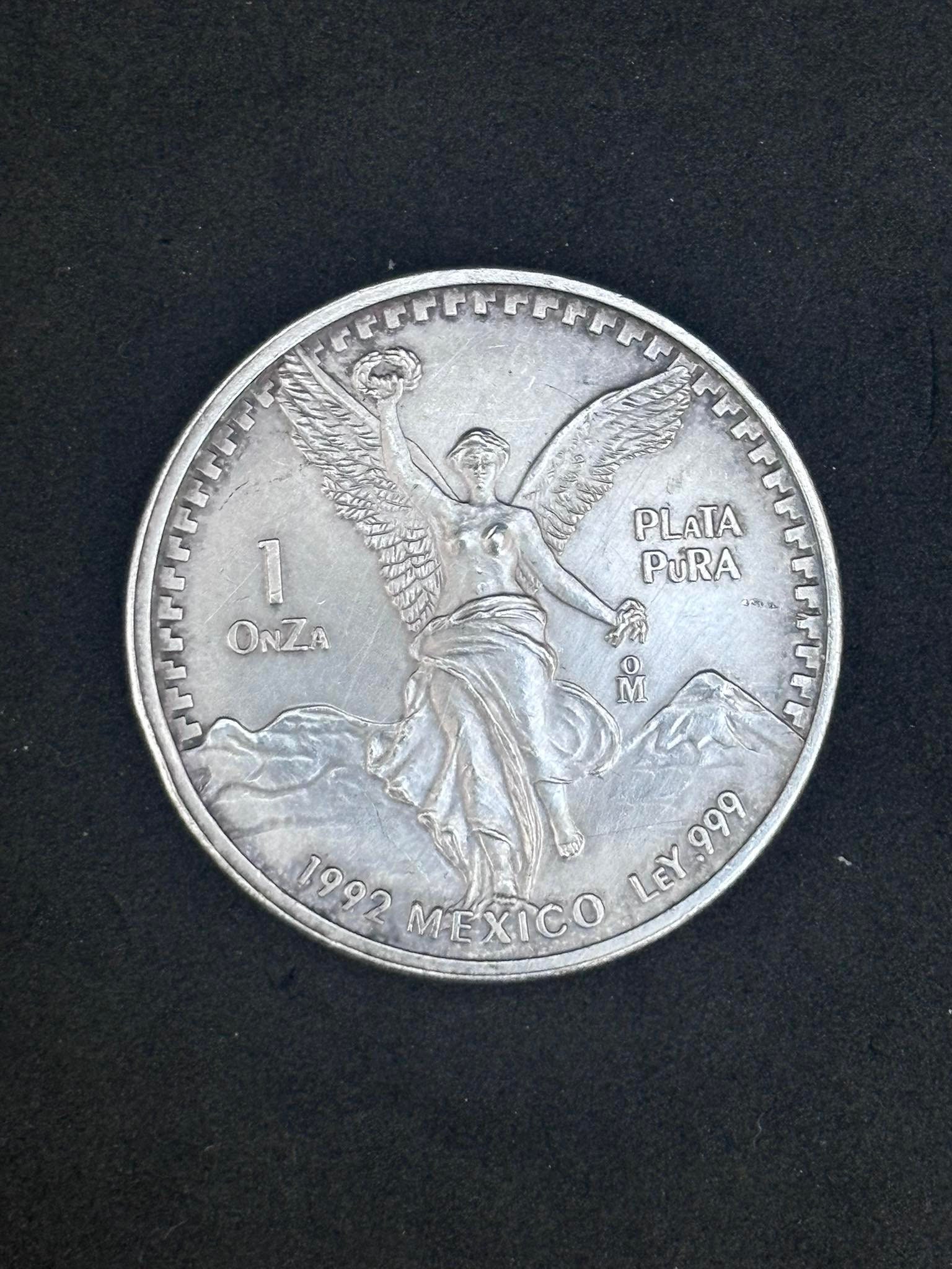 1992年 メキシコ 1オンス 銀貨 il_fullxfull.5698447512_idyg.jpg