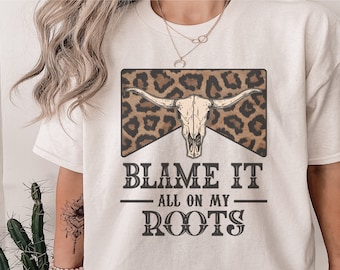 Blame it all on my roots shirt Ladies Tshirt Country Music Shirt Country Concert Tshirt Cow Skull Shirt Leopard Print Cowgirl Shirt