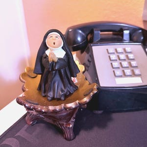 Sister Folk nun figurine.