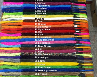 May include: A close-up view of 32 strands of beads, each a different color. The beads are arranged vertically, with the color names listed to the right of each strand. The colors include light amethyst, green, topaz, black, fuchsia, aquamarine, sapphire, Montana, emerald, jongnil, white, tea, orange, light peach, light Siam, red, Siam, champagne, aqu bohemica, light rose, blue zircon, lct, rose, mix colors, amethyst, l. grey, yellow, fruit green, dark aquamarine, l. topaz, peridot, and olivine.
