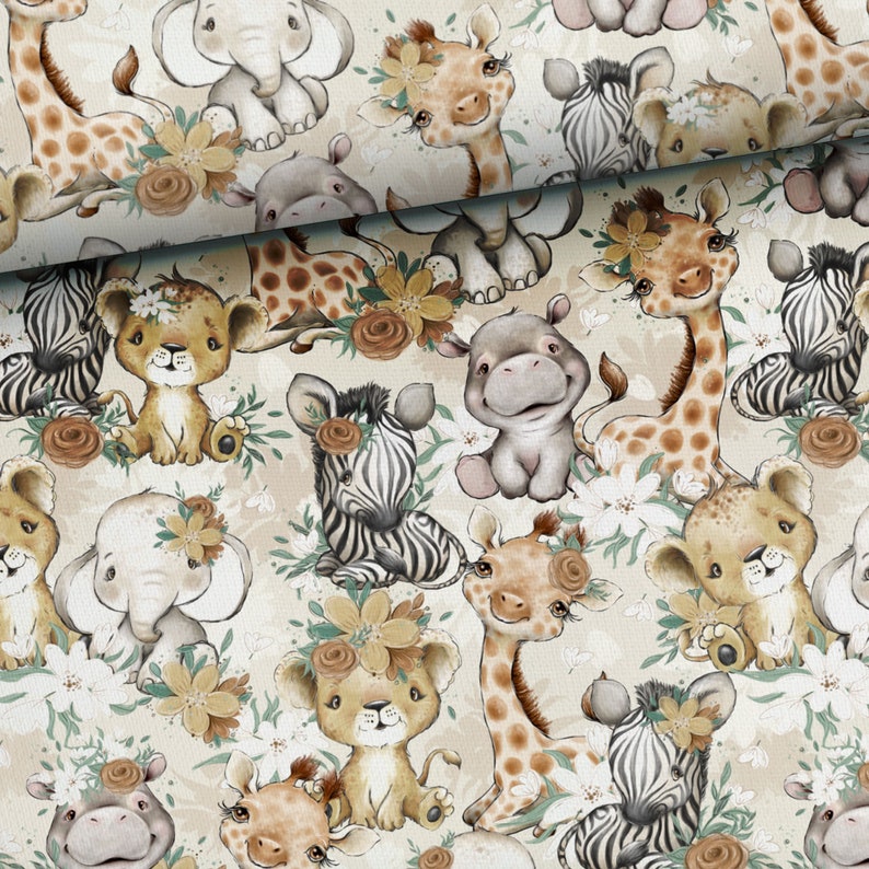 May include: A beige fabric with a repeating pattern of various animals, including giraffes, elephants, hippos, zebras, and lions. The animals are all wearing floral crowns and are surrounded by flowers and leaves.