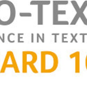 May include: Gray and yellow logo with the text "OEKO-TEX&reg; CONFIDENCE IN TEXTILES STANDARD 100". The logo features a stylized gray circle with a globe inside.