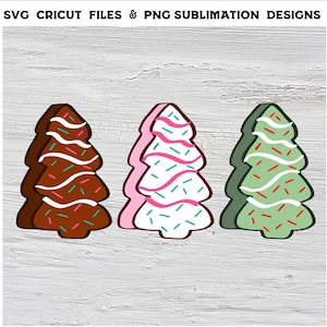 Könnte beinhalten: Drei Weihnachtsbaum-Kekse mit verschiedenen Frosting- und Streuselfarben. Die Bäume sind braun, weiß und grün.