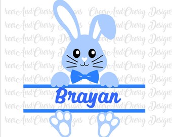 May include: Blue bunny rabbit with a bow tie peeking over a double line with the name Brayan written in blue cursive letters. The bunny has white paws and a white nose.