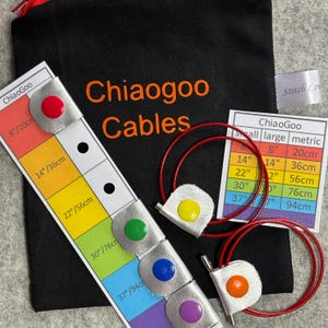 May include: A set of colorful ChiaoGoo knitting cables in various sizes, ranging from 8 inches to 37 inches. The cables are red and come with silver-colored ends. A chart shows the corresponding measurements in inches and centimeters.