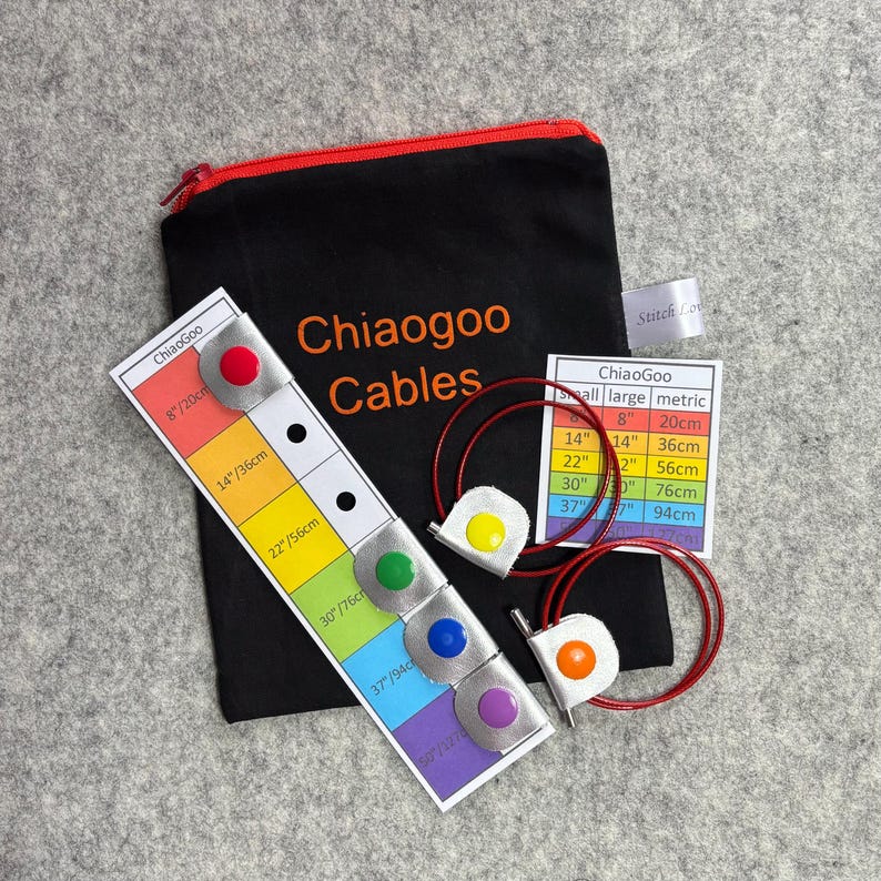 May include: A set of colorful ChiaoGoo knitting needles with a black zippered pouch and a chart showing the different sizes in inches and centimeters. The needles are red, yellow, green, blue, and purple.