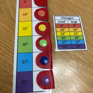 May include: A color-coded chart with red, orange, yellow, green, blue, and purple circles on a red background. The chart is labeled "Chiaogoo" and shows different sizes in inches: 8", 14", 22", 30", 37", and 50". A separate chart labeled "Chiaogoo" shows "small" and "large" sizes in inches.