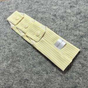 Needle keeper for flexible double pointed knitting needle sets. CrasyTrio needle case. FlexiFlip needle case.