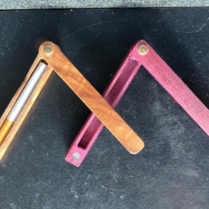 Custodia protettiva con estinzione istantanea. Purpleheart o quercia figurata Piroga in legno. Piroga in metallo. Un battitore. Tutina. Salva fiore