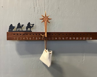 Minimalist Advent heirloom Calendar. Mahogany solid wood and leather pouch.