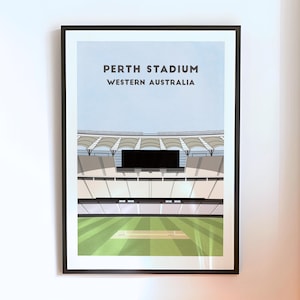May include: Framed print of Perth Stadium, Western Australia. The artwork depicts the stadium's architecture under a light blue sky, with the text "PERTH STADIUM WESTERN AUSTRALIA". The stadium's field is green with a cricket pitch.