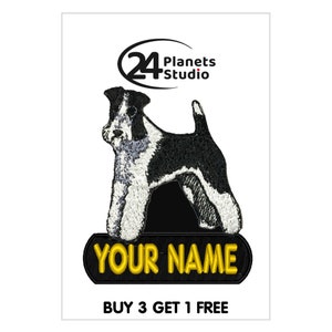 May include: Embroidered iron-on patch featuring a black and white Wire Fox Terrier dog with the text "YOUR NAME" in gold lettering on a black background. The patch is from 24 Planets Studio.