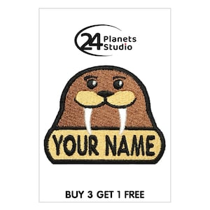 May include: Brown embroidered iron-on patch of a cartoon walrus with white tusks and the text "YOUR NAME" in a yellow banner.