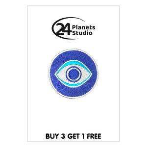 May include: A circular blue embroidered patch with a stylized eye design in white and turquoise. The patch is on a white background with the text "BUY 3 GET 1 FREE". The "24 Planets Studio" logo is at the top of the image.