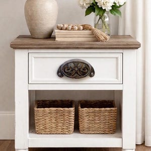 May include: A rustic wooden sign with the text "Welcome to our home" in white lettering. The sign features a distressed finish and a simple, inviting design, perfect for entryway decor.