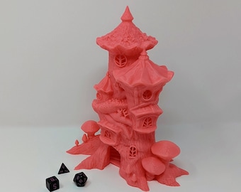 May include: A pink 3D printed miniature treehouse with a mushroom base and a ladder leading up to the top floor. There are three black dice with pink numbers on the ground in front of the treehouse.