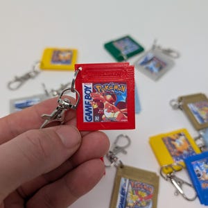 Porte-clés de poche avec cartouche de jeu Monster