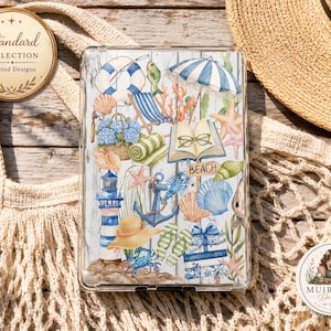 May include: A clear tablet case featuring a watercolor print of beach-themed items including a lighthouse, anchor, blue and white striped umbrella, seashells, starfish, a crab, a sun hat, flip-flops, a book with glasses, and a sign reading BEACH.