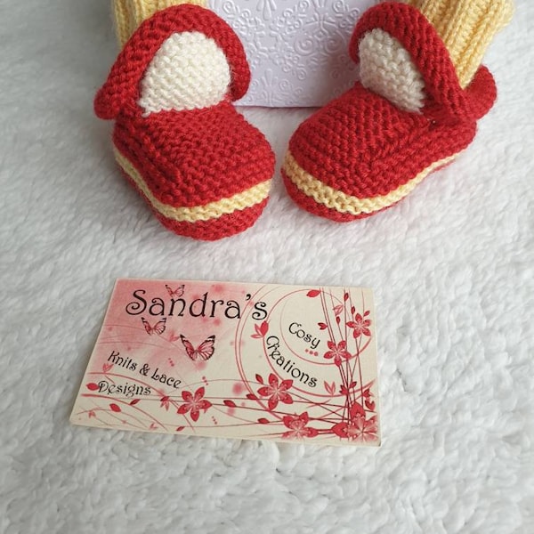 Knitted baby booties cars