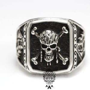 Bague pirates des caraïbes, bague tête de mort pirates des caraïbes, bijoux tête de mort, argent sterling 925 noir oxydé.
