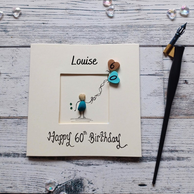 Personalised 60th Birthday card for her, Happy 60th Birthday card, pebble art- lady holding balloons.