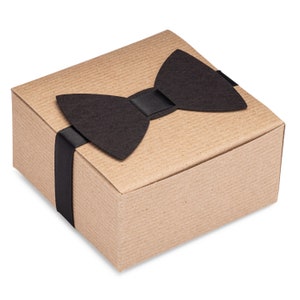4x4x2 kraft gift box tied with ribbon and paper bow tie. Make gifting to your wedding party easy with our sock gift box.