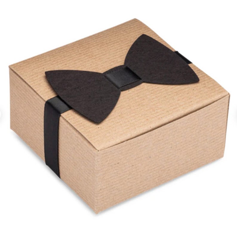 4x4x2 kraft gift box tied with ribbon and paper bow tie. Make gifting to your wedding party easy with our sock gift box.