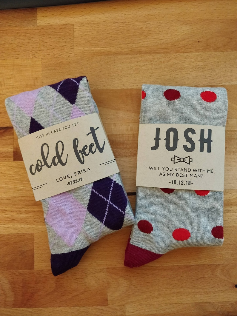 Purple argyle sock with our no cold feet custom label. Red polka dot sock with our custom best man label.