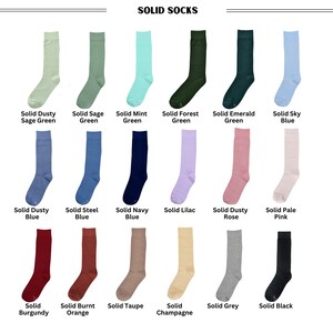 No Cold Feet Collection of solid mens dress sock patterns. Choose from Dusty Sage Green, Sage Green, Mint, Emerald Green Socks, Sky Blue Socks, Dusty Blue, Steel Blue, Navy, Lilac, Dusty Rose, Pale Pink, Burgundy, Burnt Orange Socks, Grey and Black.