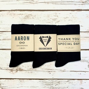 Solid Black Groomsmen Socks with Personalized kraft labels for wedding day. Kraft labels make these black socks the perfect gift for your wedding day.