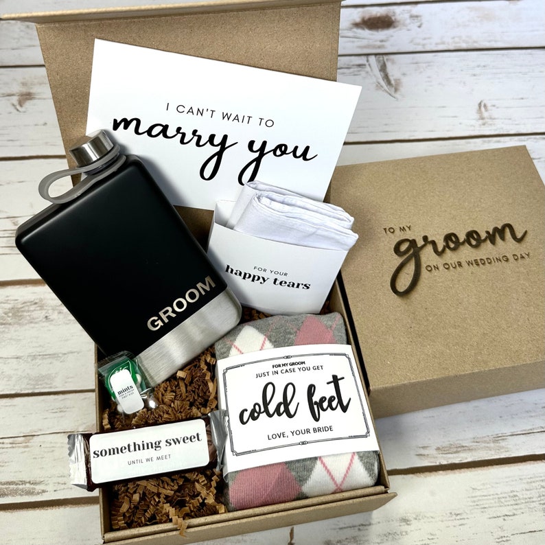 Grooms Survival Gift Box with No Cold Feet Socks, Personalized flask and pocket square. Top of Box is laser cut with "To my groom on our wedding day." Gift From Bride to Groom on Wedding day.
