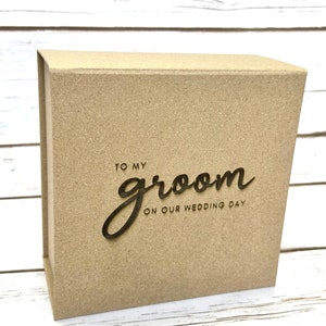 6 x 6 x 2.5 magnetic close groom survival box is laser engraved with To my groom on our wedding day. Gift From Bride to Groom on Wedding day.
