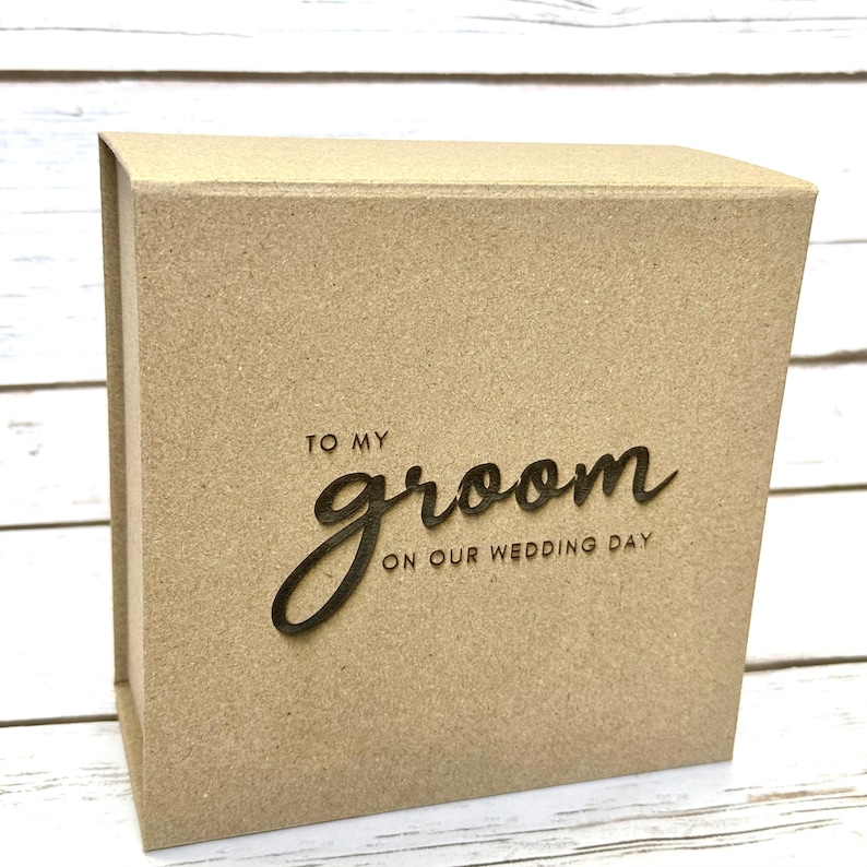 6 x 6 x 2.5 magnetic close groom survival box is laser engraved with To my groom on our wedding day. Gift From Bride to Groom on Wedding day.