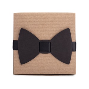 4x4x2 kraft gift box tied with ribbon and paper bow tie. Make gifting to your wedding party easy with our sock gift box.