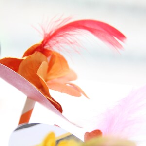 These super cute and unique Kentucky Derby Party hat drink stirrers are sure to cause a stir at your next party.  Perfect to display on the bar for your next equestrian themed event.  Everyone gets a Derby Hat to use in their drink