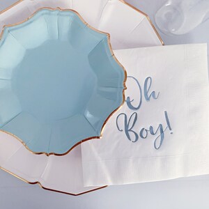 'Oh Boy' in ice blue foil on white paper napkins are the perfect touch for balancing all the tasty treats that will be served at the baby shower!
You can select your color choice from the drop down menu.  Everything from forest green and gold, to red on white, and ice blues and navys.  You can match your baby shower themes with ease with these napkins.