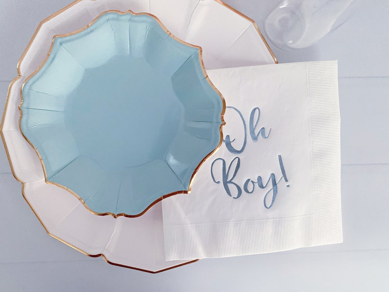 'Oh Boy' in ice blue foil on white paper napkins are the perfect touch for balancing all the tasty treats that will be served at the baby shower!
You can select your color choice from the drop down menu.  Everything from forest green and gold, to red on white, and ice blues and navys.  You can match your baby shower themes with ease with these napkins.