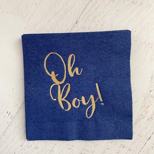 'Oh Boy' in ice blue foil on white paper napkins are the perfect touch for balancing all the tasty treats that will be served at the baby shower!
You can select your color choice from the drop down menu.  Everything from forest green and gold, to red on white, and ice blues and navys.  You can match your baby shower themes with ease with these napkins.