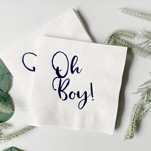 'Oh Boy' in ice blue foil on white paper napkins are the perfect touch for balancing all the tasty treats that will be served at the baby shower!
You can select your color choice from the drop down menu.  Everything from forest green and gold, to red on white, and ice blues and navys.  You can match your baby shower themes with ease with these napkins.