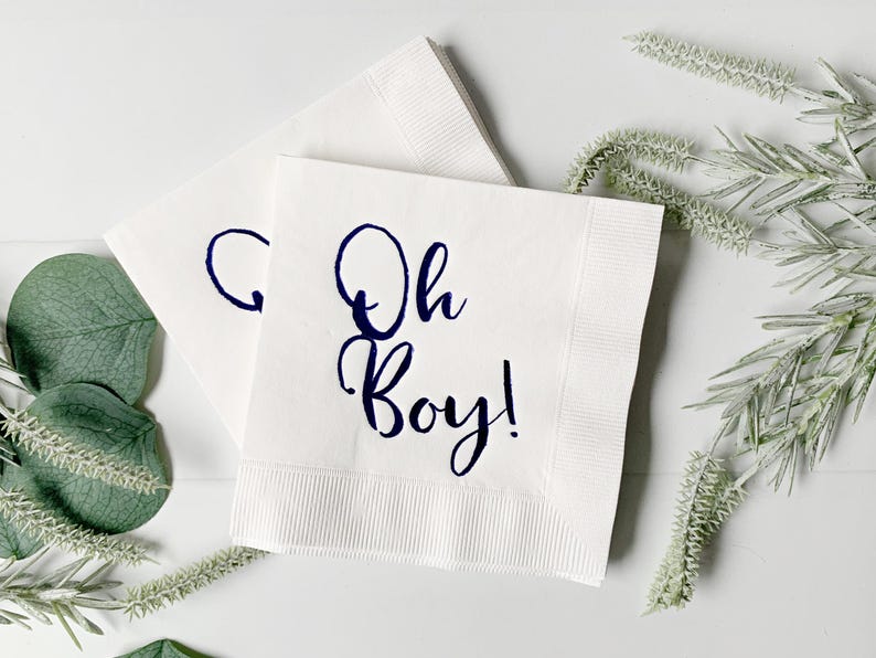 'Oh Boy' in ice blue foil on white paper napkins are the perfect touch for balancing all the tasty treats that will be served at the baby shower!
You can select your color choice from the drop down menu.  Everything from forest green and gold, to red on white, and ice blues and navys.  You can match your baby shower themes with ease with these napkins.