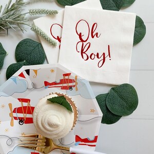 'Oh Boy' in ice blue foil on white paper napkins are the perfect touch for balancing all the tasty treats that will be served at the baby shower!
You can select your color choice from the drop down menu.  Everything from forest green and gold, to red on white, and ice blues and navys.  You can match your baby shower themes with ease with these napkins.