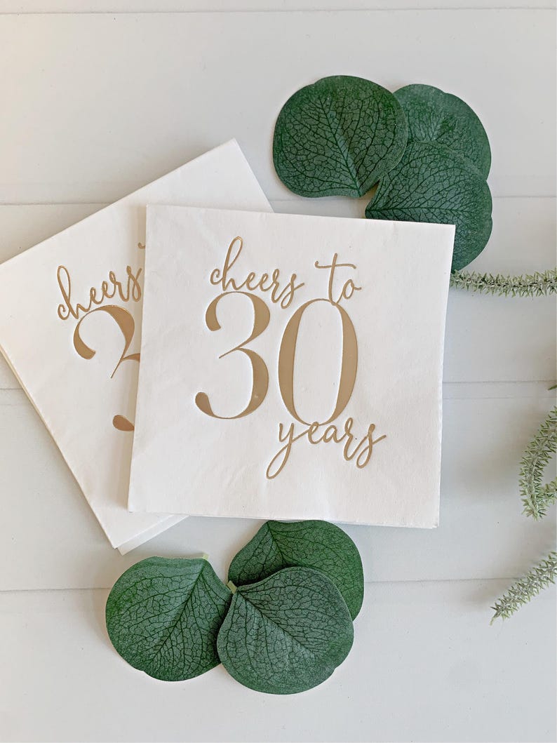 Raise a toast to 30 remarkable years with our "Cheers to 30 Years" Cocktail Napkins featuring stunning gold foil accents! These napkins are the perfect addition to your 30th birthday or anniversary celebration, adding a touch of elegance and style