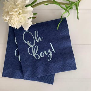 'Oh Boy' in ice blue foil on white paper napkins are the perfect touch for balancing all the tasty treats that will be served at the baby shower!
You can select your color choice from the drop down menu.  Everything from forest green and gold, to red on white, and ice blues and navys.  You can match your baby shower themes with ease with these napkins.