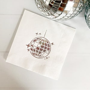 Our gorgeous iridescent foiled disco ball cocktail napkins are perfect for your disco-themed event. These are perfect for a wedding, bachelorette, birthday party or New Year's Eve.