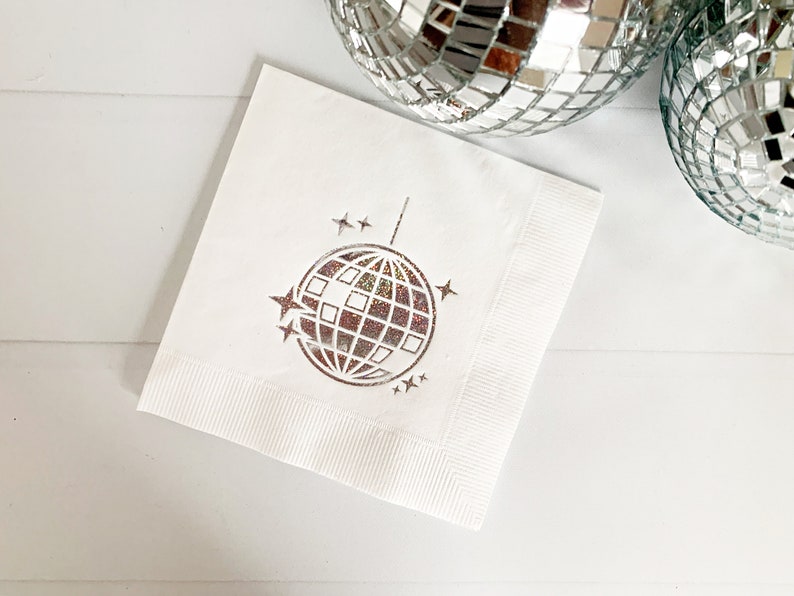 Our gorgeous iridescent foiled disco ball cocktail napkins are perfect for your disco-themed event. These are perfect for a wedding, bachelorette, birthday party or New Year's Eve.