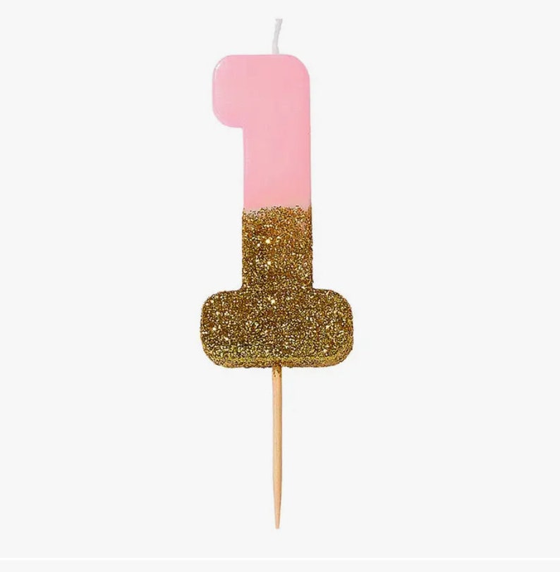 Make every milestone birthday special with EnFete's Pink and Gold Glitter Dipped Birthday Number Candles. Available in all numbers, from 1 to 100, add a touch of magic and sparkle to your celebration. Shop now!