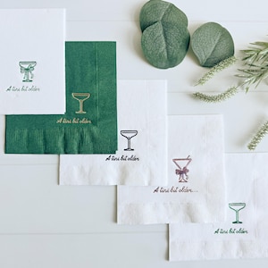 Elevate your birthday celebrations with EnFete's  "Just a tini bit old" Coupe Glass Birthday Cocktail Napkins. These elegant napkins are designed in a sophisticated social club style, featuring a coup glass logo or martini glass and "Just a tini bit older" in stunning green foil script. Perfect for a 40th, 50th or 60th birthday!
