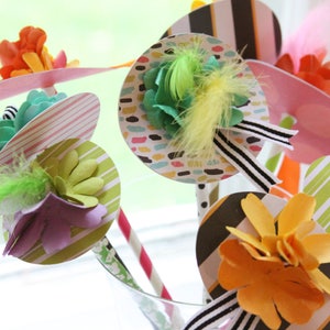 These super cute and unique Kentucky Derby Party hat drink stirrers are sure to cause a stir at your next party.  Perfect to display on the bar for your next equestrian themed event.  Everyone gets a Derby Hat to use in their drink