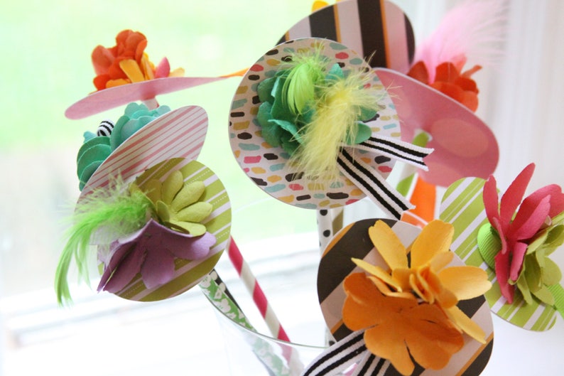 These super cute and unique Kentucky Derby Party hat drink stirrers are sure to cause a stir at your next party.  Perfect to display on the bar for your next equestrian themed event.  Everyone gets a Derby Hat to use in their drink